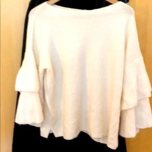 Soft, flattering off white sweater.